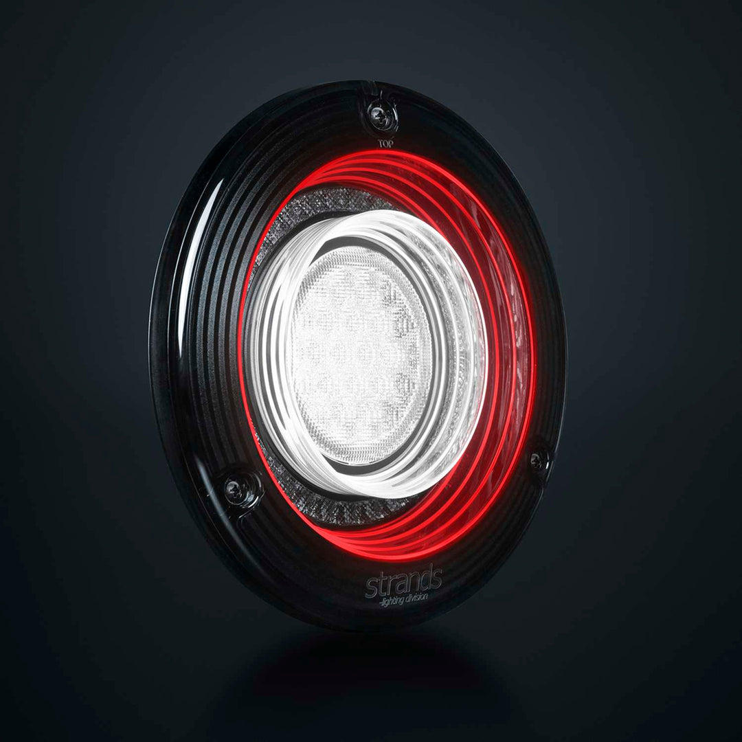 LED driving lights, cube lights, and a modern reverse/fog tail light installed on a heavy-duty truck for enhanced nighttime and job site visibility