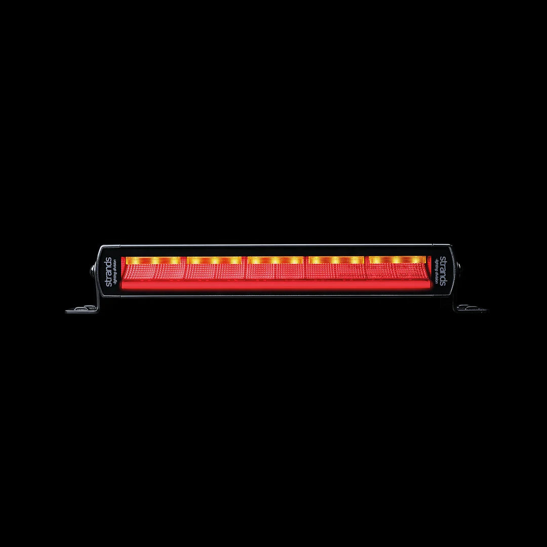 Heavy-duty truck equipped with LED tail and position light bar for enhanced rear visibility