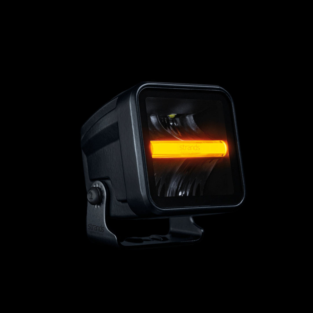 LED cube lights and light bar installed on a heavy-duty truck for enhanced nighttime driving visibility and safety.