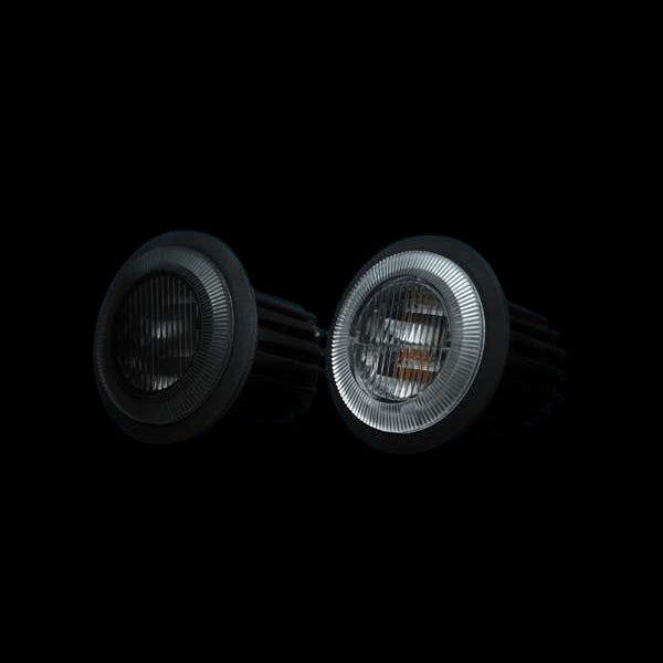 Amber LED strobe and driving lights installed on a heavy-duty truck bumper for worksite visibility