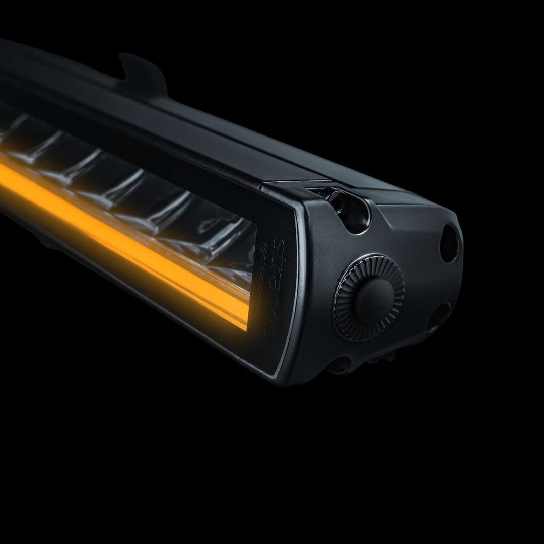LED single row light bar mounted on truck bumper for improved nighttime driving visibility