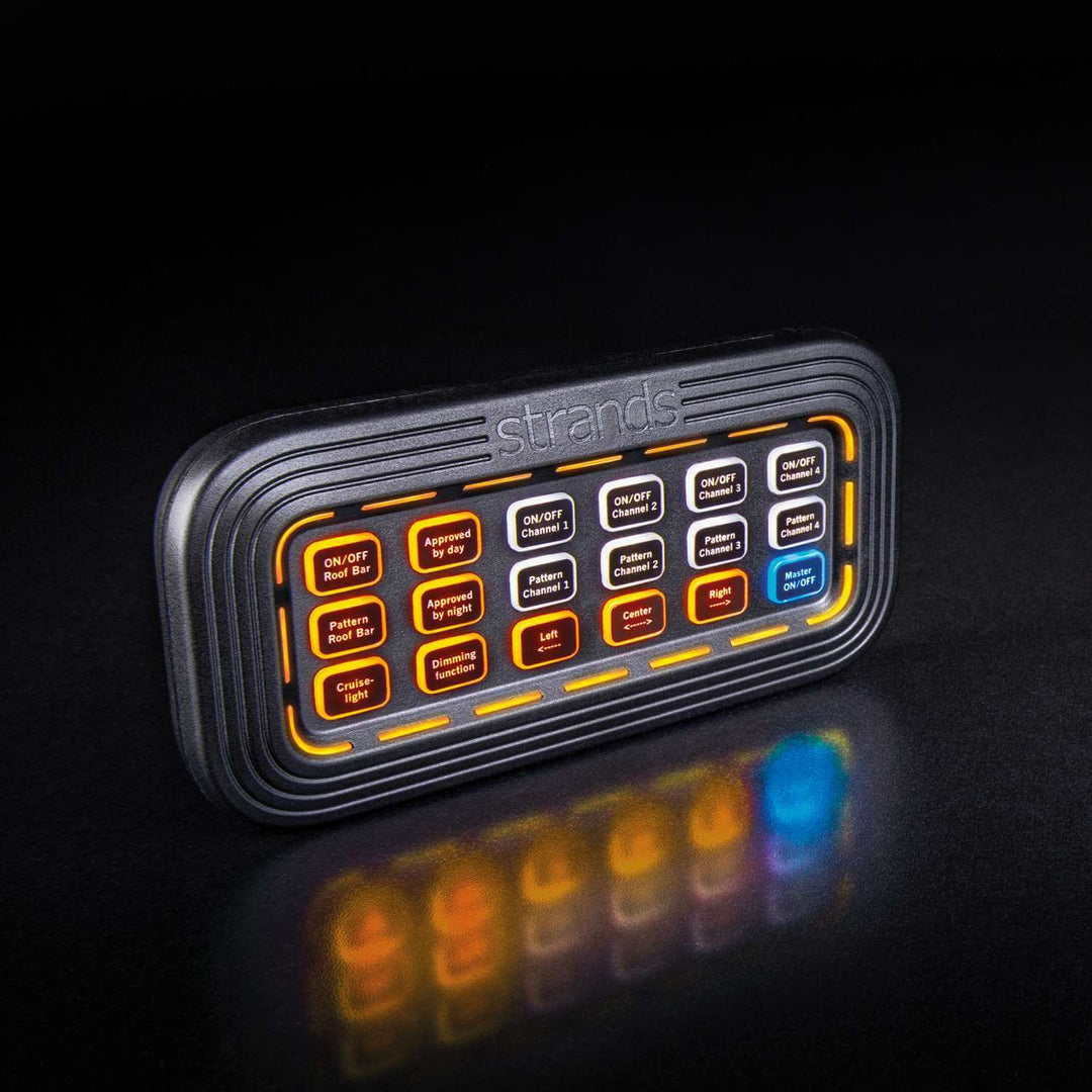 Close-up of Cruise Light wireless controller with backlit buttons and labels