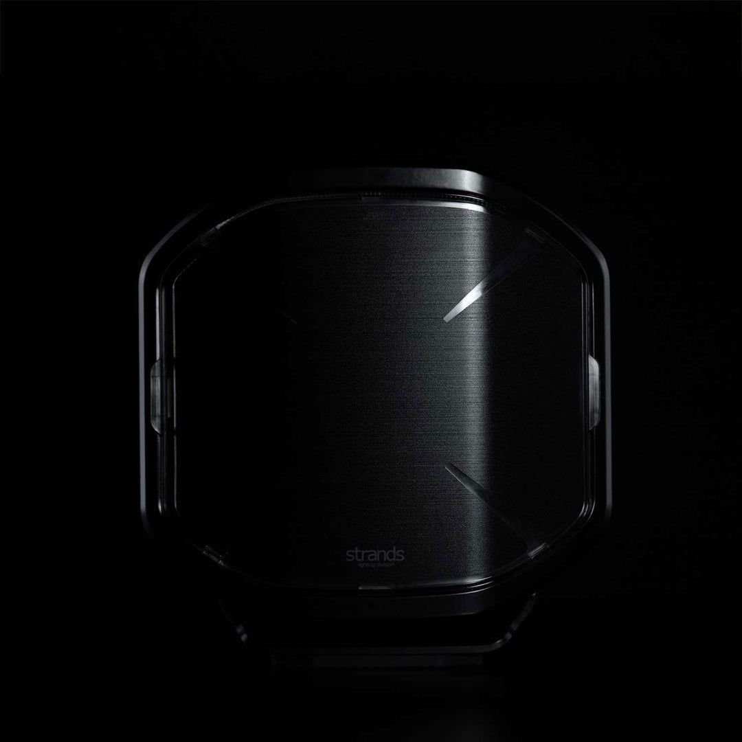Siberia X 7-inch lens cover installed on light, front view with dark background