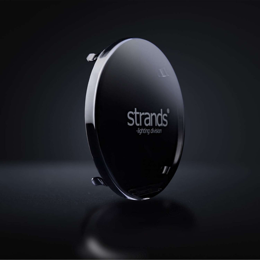 Angled side view of the Siberia 7 inch dark tinted lens cover showing logo and clips